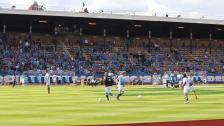 Warm up before the match and fans singing